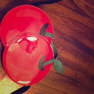 I am selling a cherry purse it is barely worn